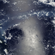 Illustration for article titled A Combination of Volcanic Smog and Sunglint Is Breathtaking